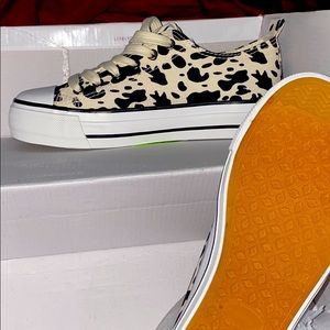 Olivia Miller (cow print chucks)